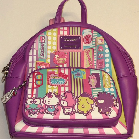 Loungefly Handbags - NWT Sanrio Loungefly Purple Backpack